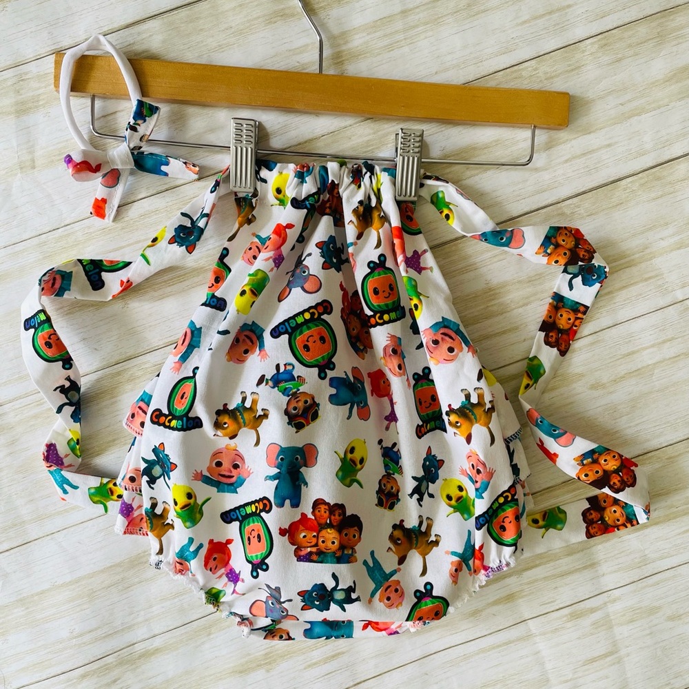 NEW Cocomelon ruffle romper & headband set  12/18